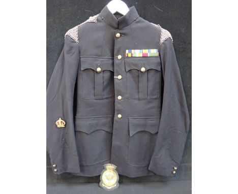 A MILITARY TUNIC, WITH MAIL EPAULETTES the brass buttons marked 'IV VII' under a crown, with attached gold thread crown badge