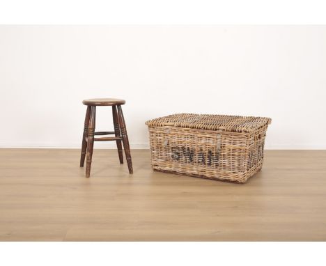 A VINTAGE WICKER LAUNDRY HAMPER stamped with 'SWAN LAUNDRY' and secured by leather hinges and straps 39cm x 77cm x 55cm; and 