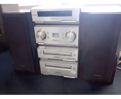 A TECHNICS HI-FI SYSTEM with CD, amplifier, stereo tuner, cassette deck and speakers (untested)