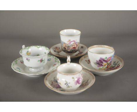 A GROUP OF FOUR MEISSEN PORCELAIN CUPS AND SAUCERS all with blue crossed swords marks to the base, including a cabinet cup an