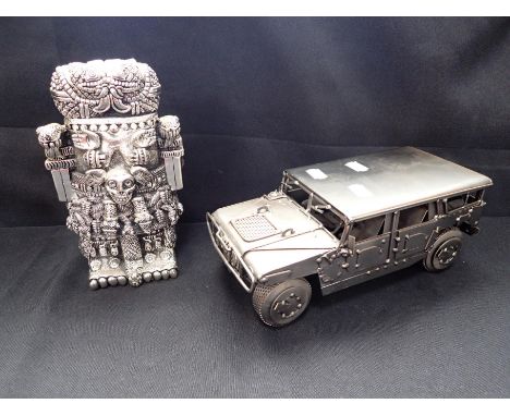 A MEXICAN SILVER-PLATED ZANFELD AZTEC/INCA FIGURE 21cm high, and a metal model jeep (2)