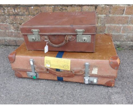 A VINTAGE LEATHER SUITCASE 45cm wide (a/f), and a vintage composition 'Revelation' case  67cm wide (2)