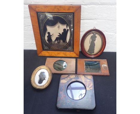 REGENCY SILHOUETTE OF JAMES SWORD ESQ with child and elaborate frame, all reverse painted on convex glass, with period maple 