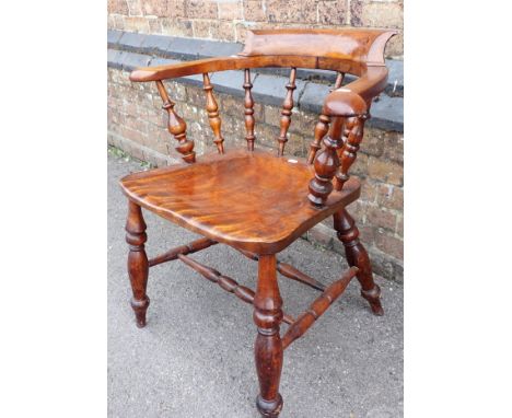 A 19th CENTURY SMOKERS BOW CHAIR mahogany (later varnished over)
