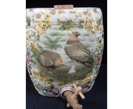 A LARGE CERAMIC WHISKY BARREL, DECORATED WITH BIRDS marked 'Hand decorated, Wales', and signed 30cm high
