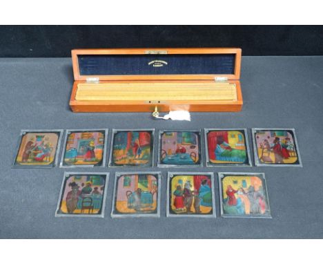BOXED SET OF ARCHITECTS OR ENGINEERS RULERS by Negretti &amp; Zambra, mid 19th century, with magic lantern slides, Goldilocks