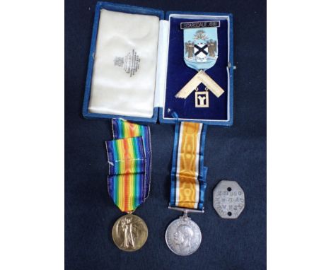 A WWI PAIR AWARDED 175038 GNR. F.J. HUDSON. R. A. with dog tag and associated silver Masonic jewel