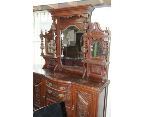 Victorian mahogany dresser with raised bevelled edge mirror back above bow front with two drawers above panelled cupboard doo