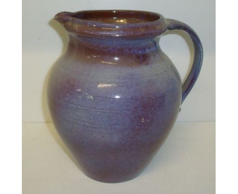 Large Poole Pottery with impressed mark to base W/P on purple ground (height 23cm)
