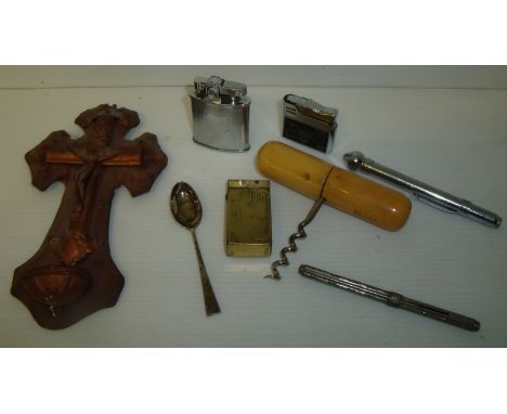 Copper crucifix mounted on leather and canvas mount, selection of lighters including Rolstar and brass lighter with enamel sh