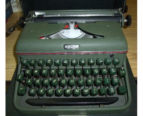 Cased Halder typewriter with instructions