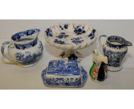 Small box of blue and white ceramics including 19th C transfer printed jug with central crest and various scenes depicting co