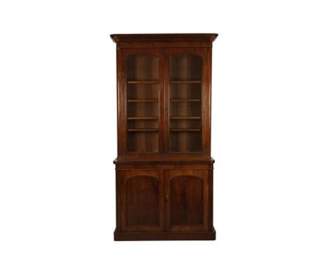 VICTORIAN MAHOGANY BOOKCASEthe moulded cornice above double glazed doors shelf interior the lower section with cupboard doors