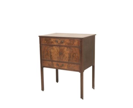 GEORGE III MAHOGANY DRESSING TABLE in the manner of Thomas Chippendale, the hinged rectangular top enclosing a fitted interio