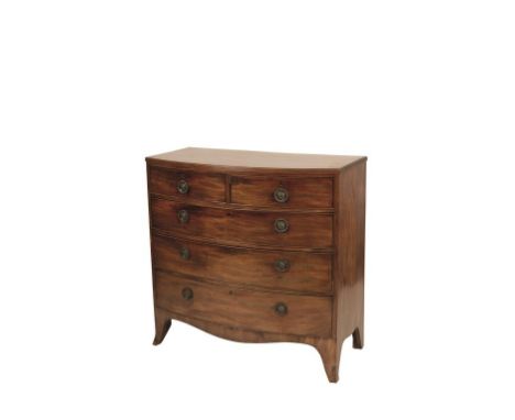 REGENCY MAHOGANY BOW FRONTED CHEST OF DRAWERS the top with reeded edge above two short and three long drawers on bracket feet