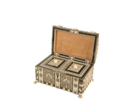 INDIAN ROSEWOOD & IVORY TEA CADDY with two lidded compartments carved ivory panels and banding on carved ivory clawed feet 10