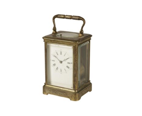 A FRENCH BRASS CASED REPEATING CARRIAGE CLOCK, the white enamel dial with Roman numerals and outer Arabic seconds numerals, t