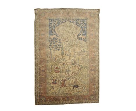 ISFAHAN STYLE RUG, the ivory ground central panel worked with a landscape of warriors, musicians, animals and stylised trees 