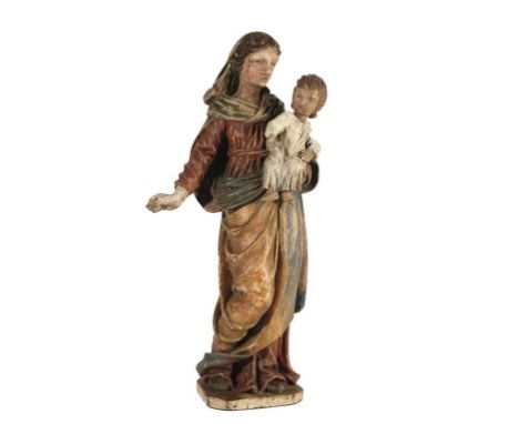 CONTINENTAL POLYCHROME PAINTED FIGURE OF MADONNA AND CHILD, 18TH / 19TH CENTURY, wearing voluminous red, blue and gold dress 