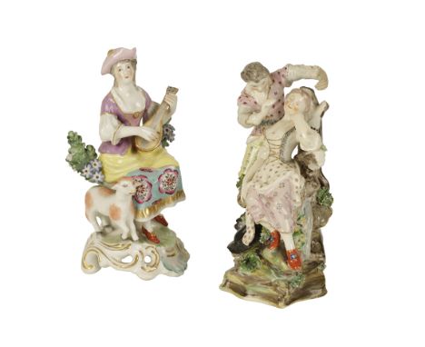 CONTINENTAL PORCELAIN 18TH CENTURY STYLE FIGURE OF A FEMALE MUSICIAN with lamp to foot, with bocage background painted in pol