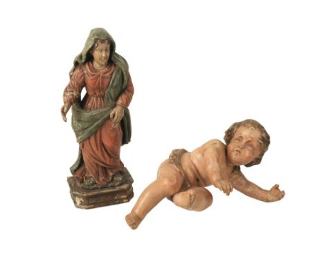CARVED POLYCHROME PAINTED FIGURE OF A SAINT, 18TH / 19TH CENTURY, modelled as the standing figure wearing a flowing red dress