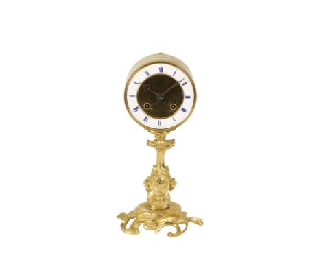 GILT METAL CASED DRUM CLOCK, the white enamel dial mounted in a gilt metal drum with eight day "Japy" type movement striking 