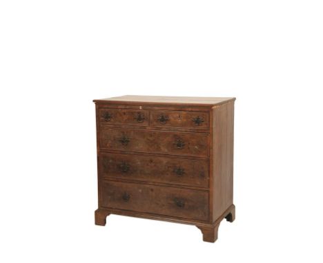 GEORGE II WALNUT CHEST OF DRAWERS, 18th century and later, with a quarter veneered top over two short and three long drawers,