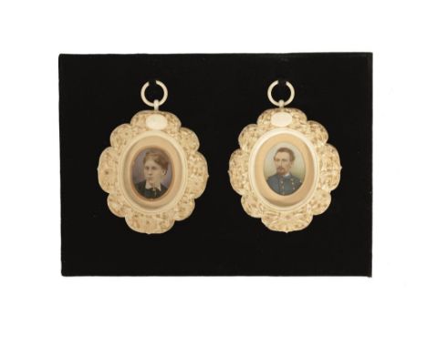 PAIR OF CARVED IVORY CHINESE EXPORT PORTRAIT MINIATURES, 19TH CENTURY depicting an officer and companion, within ornate folia