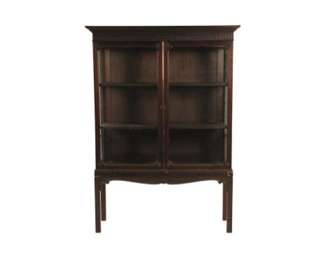 GEORGE II STYLE MAHOGANY CHINA CABINET of Chippendale design with a dentilled and blind fretwork cornice over a pair of glaze