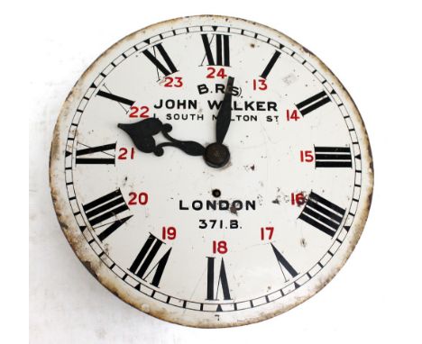 A railway station eight day weight driven clock, the circular dial set with Roman and Arabic hour markers, inscribed 'BR (S) 