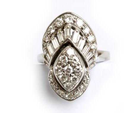 A white metal and diamond ring of abstract design, set with variously sized round cut stones, the largest approx 0.02cts, and