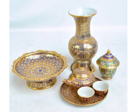 A small group of porcelain items to include a four piece tea set, with heavy gilt champlevé enamel effect decoration (7).  CO