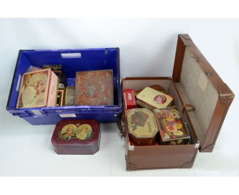 A collection of various vintage tins, to include money boxes, Oxo and a George V Silver Jubilee commemorative example.