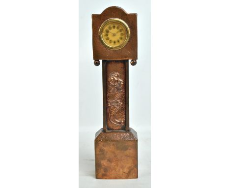 An Arts and Crafts beaten copper miniature longcase clock, with embossed stylised floral decoration, the circular dial set wi