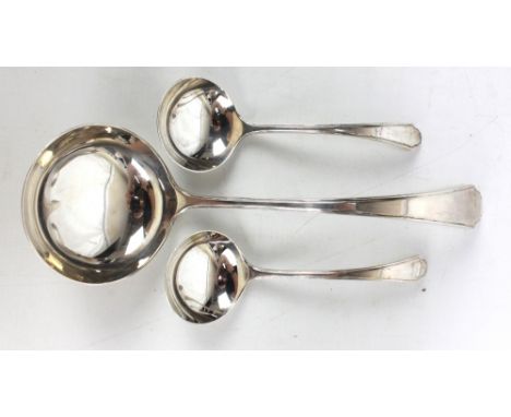 FRANK COBB & CO LTD; a George VI hallmarked silver ladle and two smaller examples, Sheffield 1945, combined approx 10.4ozt (3