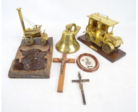 A small group of brassware to include a model of Stephenson's Rocket and similar model of a 'Vintage Taxi', and a wall mounte