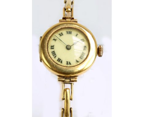 An early 20th century 18ct yellow gold cased manual wind lady's wristwatch, the circular dial set with Roman numerals, on exp