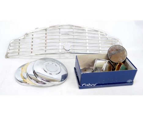 A small group of vintage car parts including a grill for a 1950s Standard 8, wing mirrors, etc.