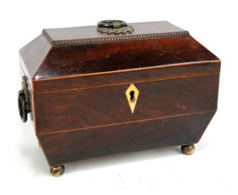 A Regency rosewood sarcophagus two section tea caddy with bone escutcheon, brass handles and ball feet, width 23cm. CONDITION