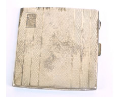 FREDERICK FIELD LTD; a George V hallmarked silver rectangular overall engine turned decorated cigarette case with vacant rect