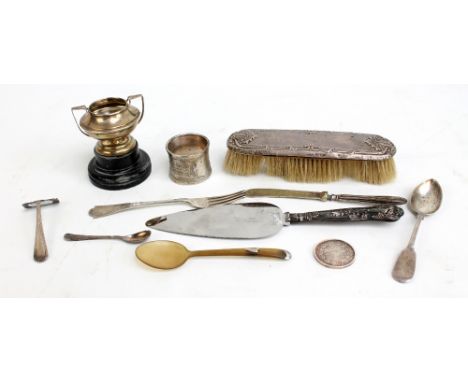 A group of variously hallmarked silver items to include a miniature trophy, Crisford & Norris, Birmingham 1928, a fork, Marti