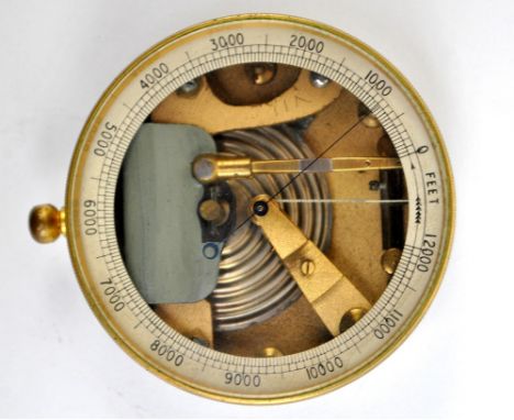 A leather cased Air Ministry issued brass pocket aneroid barometer bearing Air Ministry inscription reference no. 6B/114, mar
