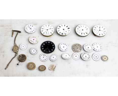 Four pocket watch enamel dials and movements to include John Rodgers of London example, number 4072, and an Elgin dial, also 