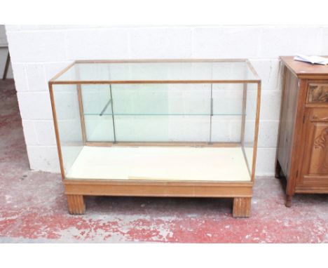 A glazed shop display counter with single internal shelf, 92 x 122 x 58.5cm. CONDITION REPORT: Very dirty, extensive wear, wi