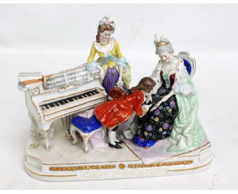 A ceramic figure group, 'Concert Premiere De Mozart', with painted and gilt decoration, blue 'S' mark and stamped numerals 10