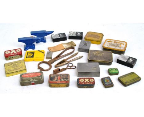 A quantity of vintage tins, two small Record anvils, a pair of candle snuffers/wick trimmers, a pair of nut crackers, etc.