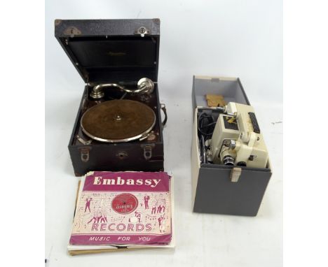 A Maxitone portable record player and small quantity of records, also a cased Noris projector. CONDITION REPORT: Turntable sp