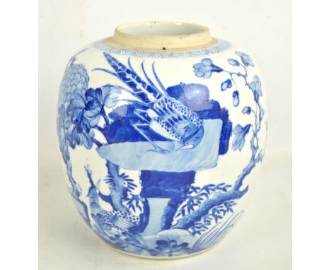 A late 19th century Chinese porcelain ginger jar painted in underglaze blue with bird amongst blossoming branches, bearing Ka