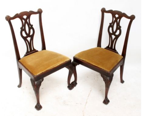 A set of six mahogany Chippendale style dining chairs on cabriole legs with ball and claw feet (6).