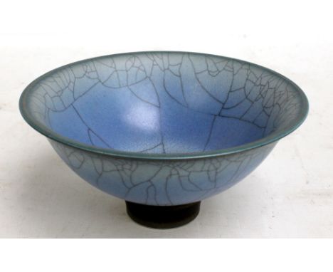A David White Pottery footed bowl with crackled light blue glaze, marked to base, diameter 15.5cm. CONDITION REPORT: Light su